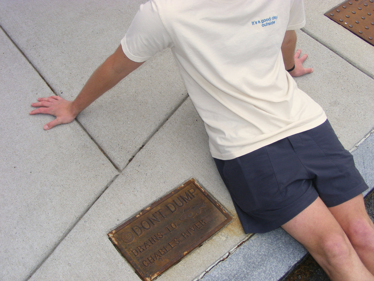 Model wearing It’s a Good Day Outside shirt by Broider. Positive embroidered shirt for everyday wear, stitched in Boston.