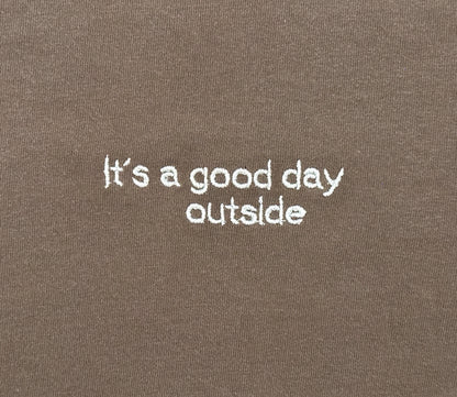 It’s a Good Day Outside embroidered shirt by Broider, front flat lay. Positive cotton tee made in Boston, creative original design.