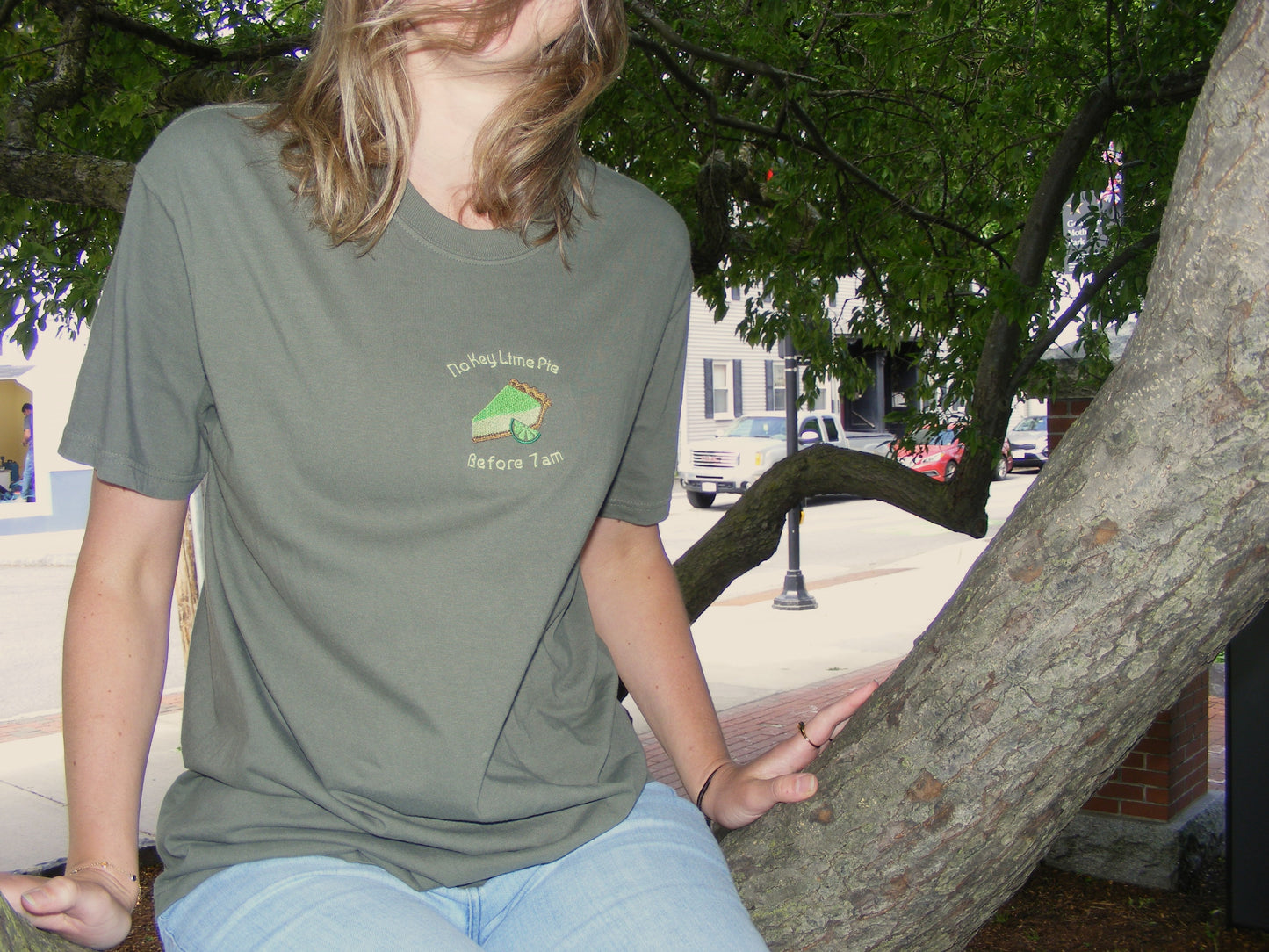 Model wearing No Key Lime Pie Before 7am shirt by Broider. Quirky embroidered tee made in Boston, perfect for morning moods.