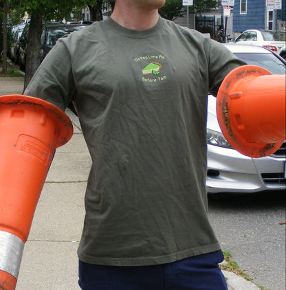 Model wearing No Key Lime Pie Before 7am shirt by Broider. Quirky embroidered tee made in Boston, perfect for morning moods.